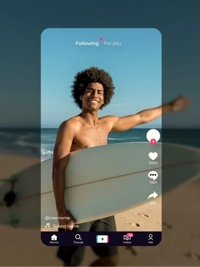 Young boy on the beach with his surfboard