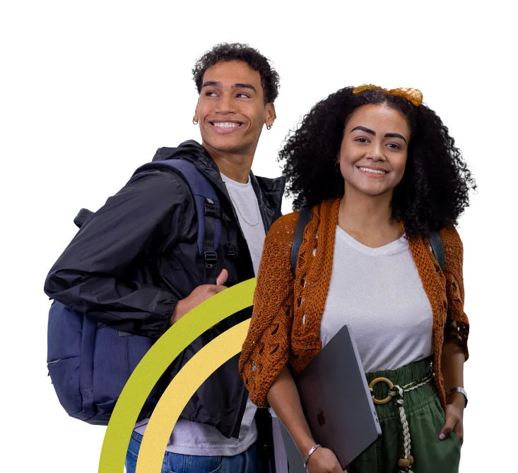 Interns smiling and holding a notebook
